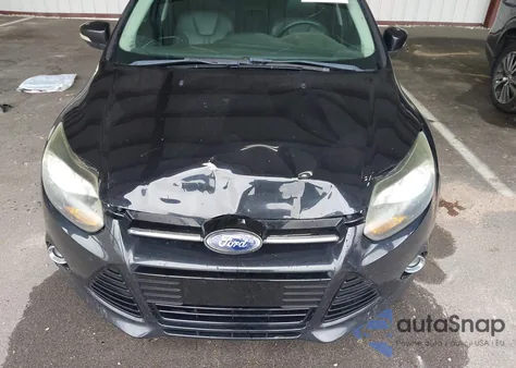 2013 Ford Focus Titanium z USA, uszkodzony, nr VIN 1FADP3J22DL150622
